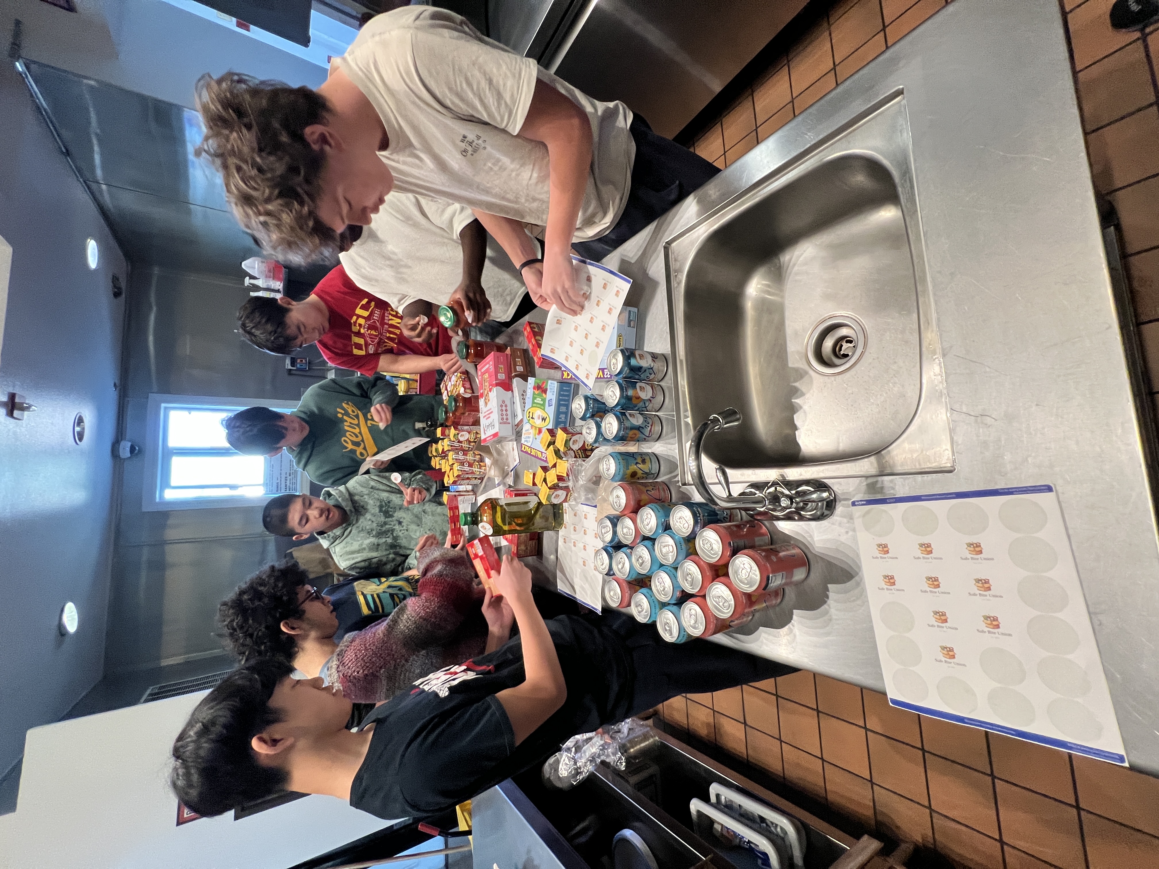 Volunteers checking and labeling food items